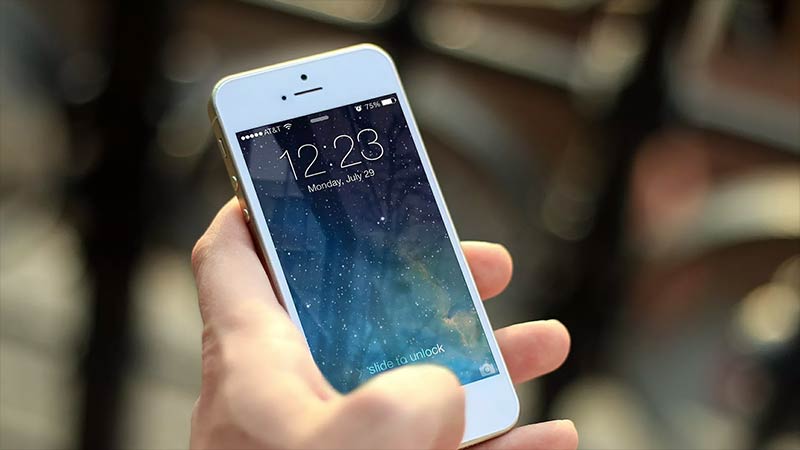 Photo of someone holding a mobile phone