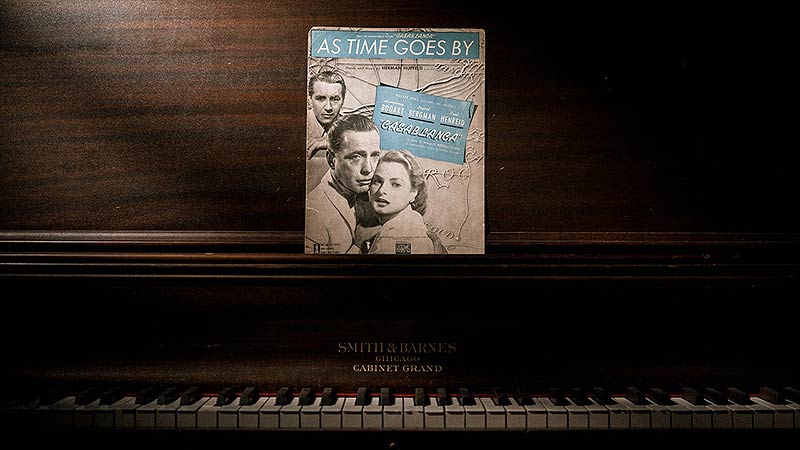 A piano and the sheet music to Casablanca Photo of a piano and the sheet music to Casablanca